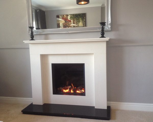 Riva 2 500 HL and Belmore fireplace in agean with the Granite hearth
