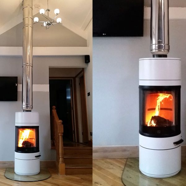 Scan white stove and stainless steel flue pipe